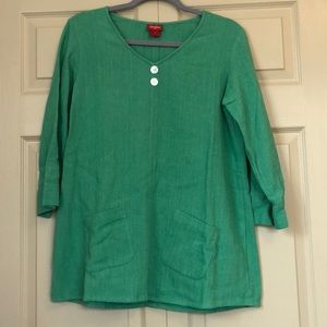 Green top with adorable pockets.